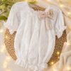 Top fille brodé blanc avec noeud beige